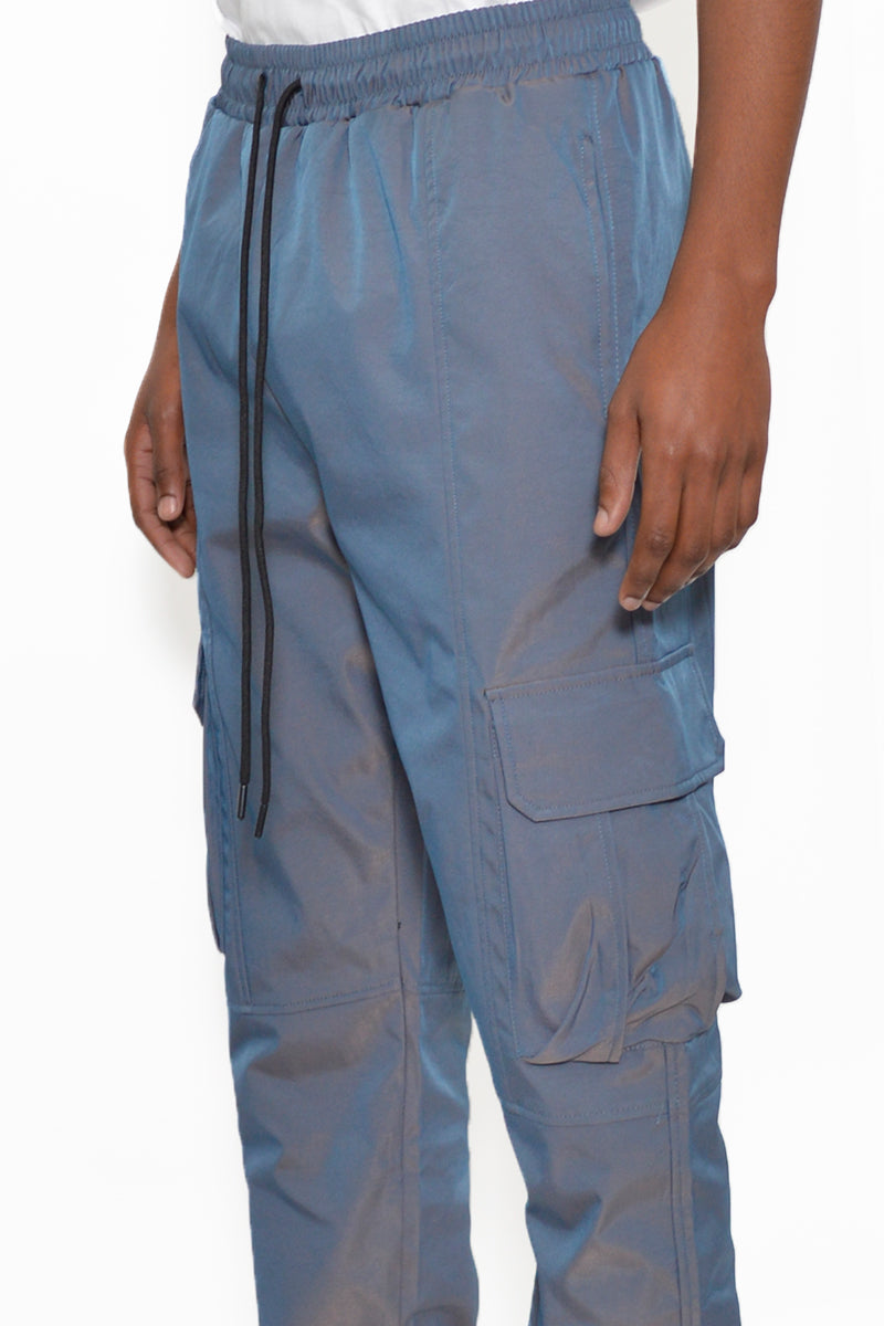 Iridescent Cargo Jogger showcasing shimmering fabric, elastic waist, and cargo pockets.