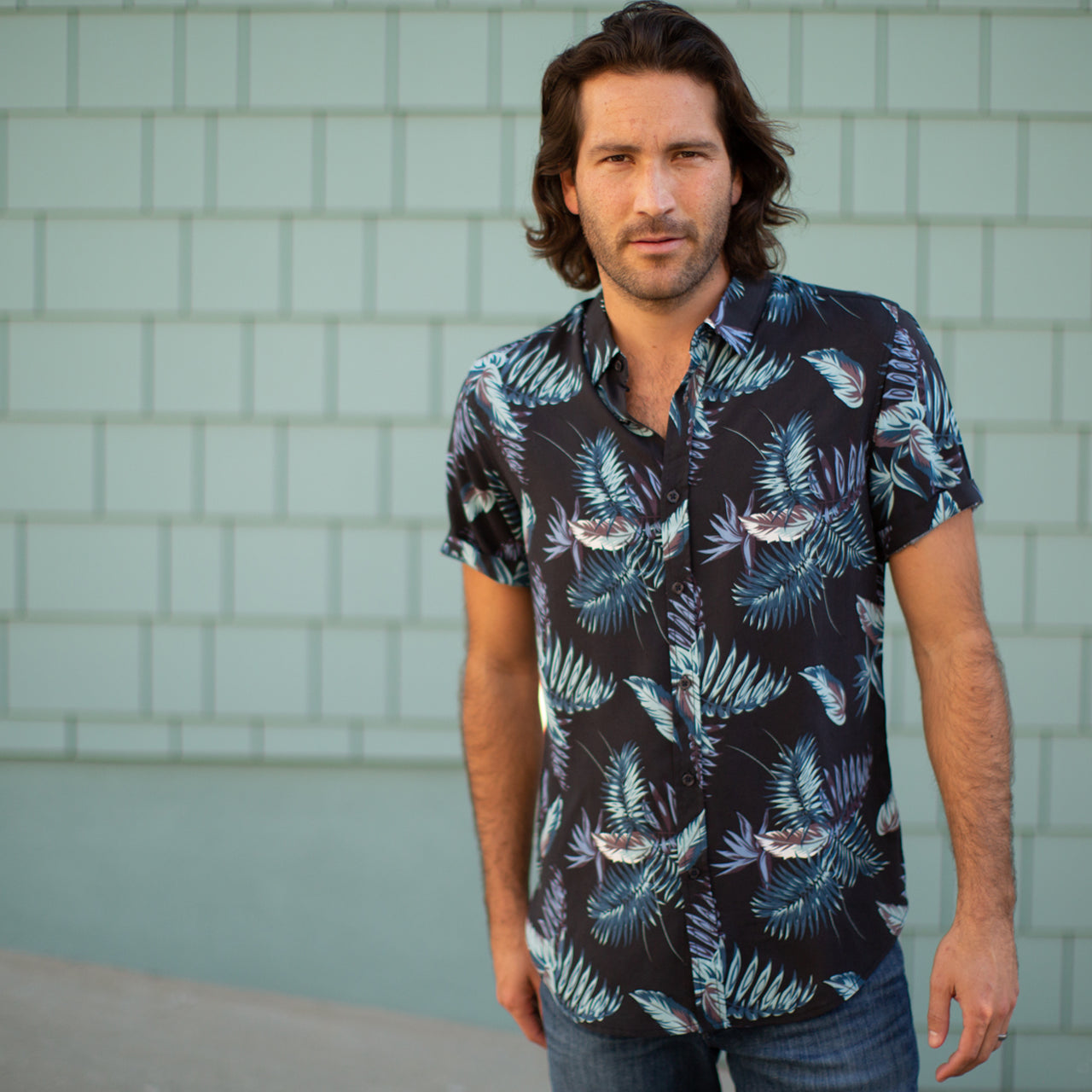 Jimmy Rayon Shirt featuring a vibrant floral print and short sleeves, made from 100% rayon fabric.