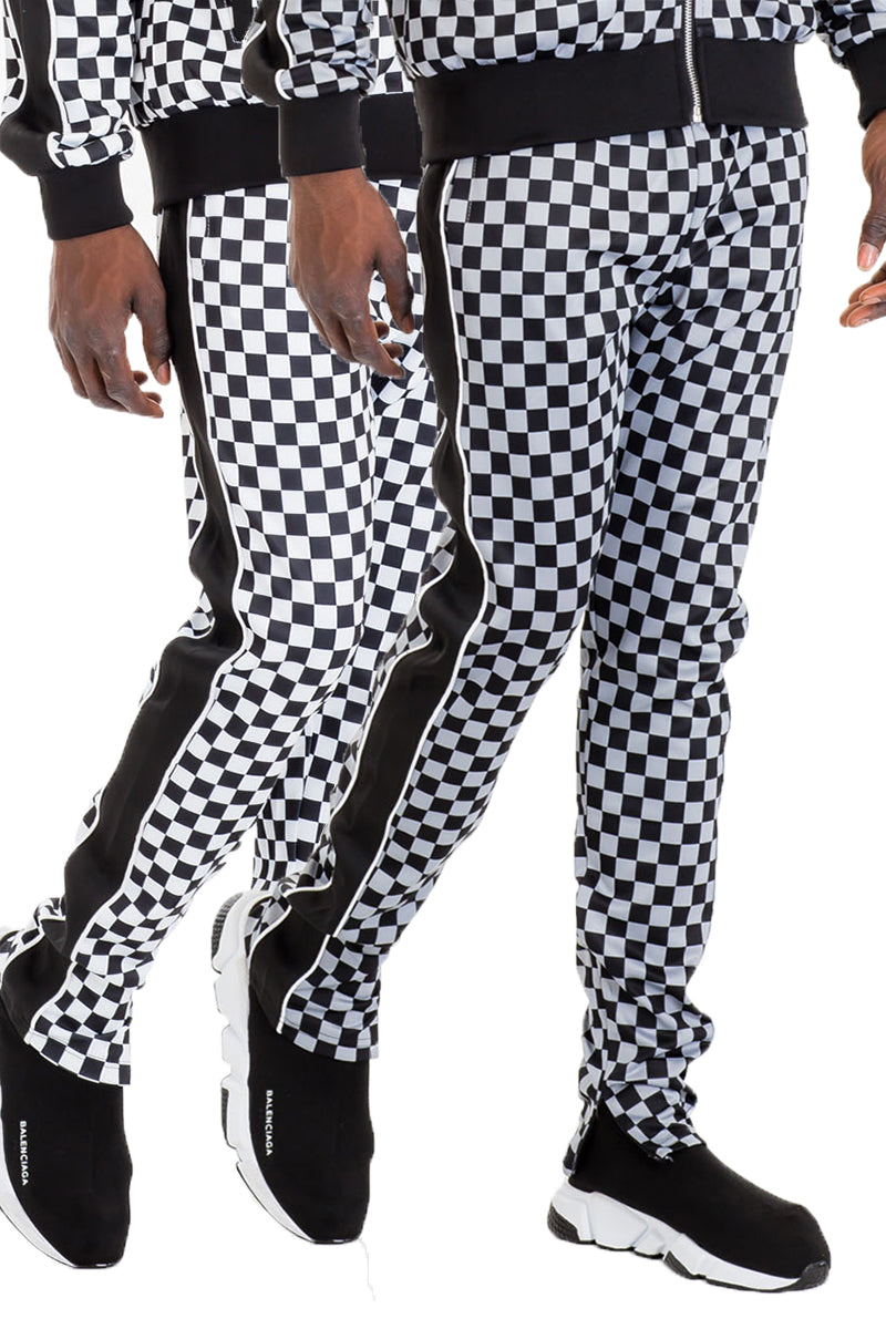 Jura Checkered Track Pants featuring a stylish checkered pattern, elastic waist with drawstring, and ankle zippers.