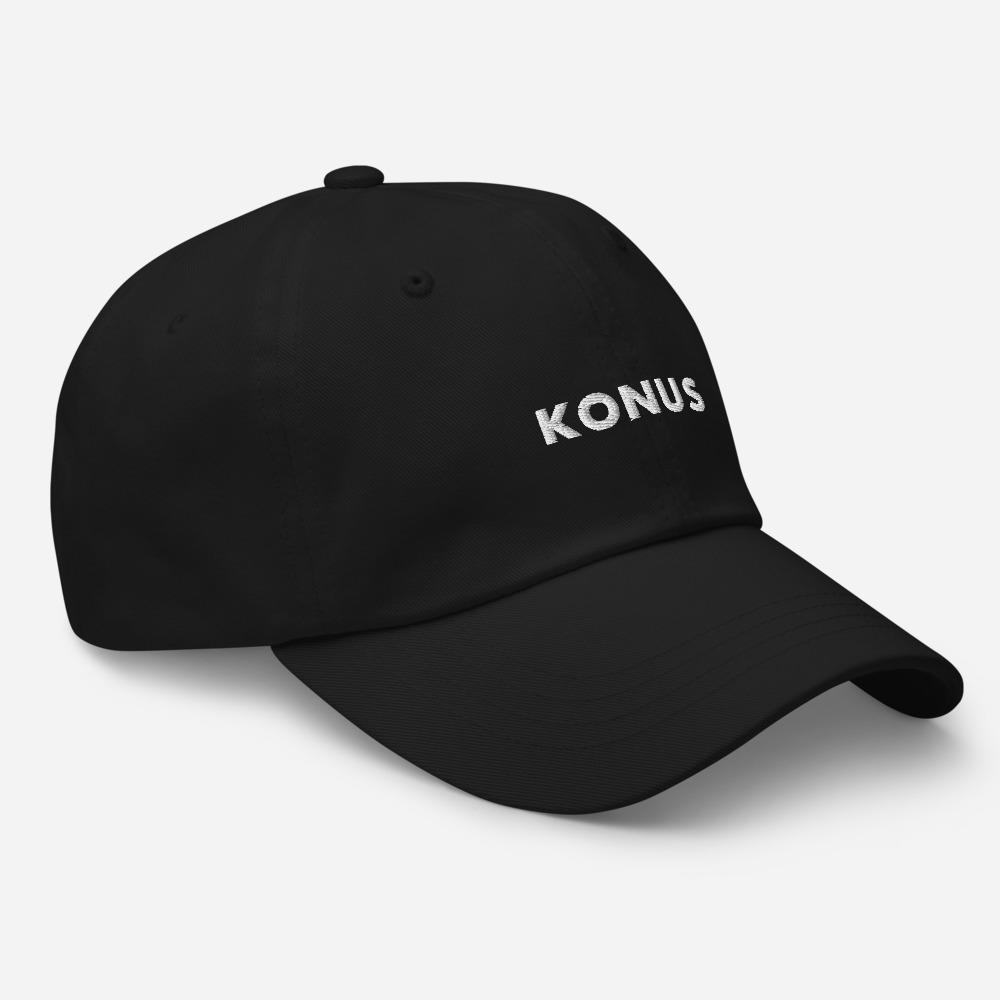 A stylish Konus Dad Hat featuring a low profile, adjustable strap, and curved visor, made from 100% chino cotton twill.