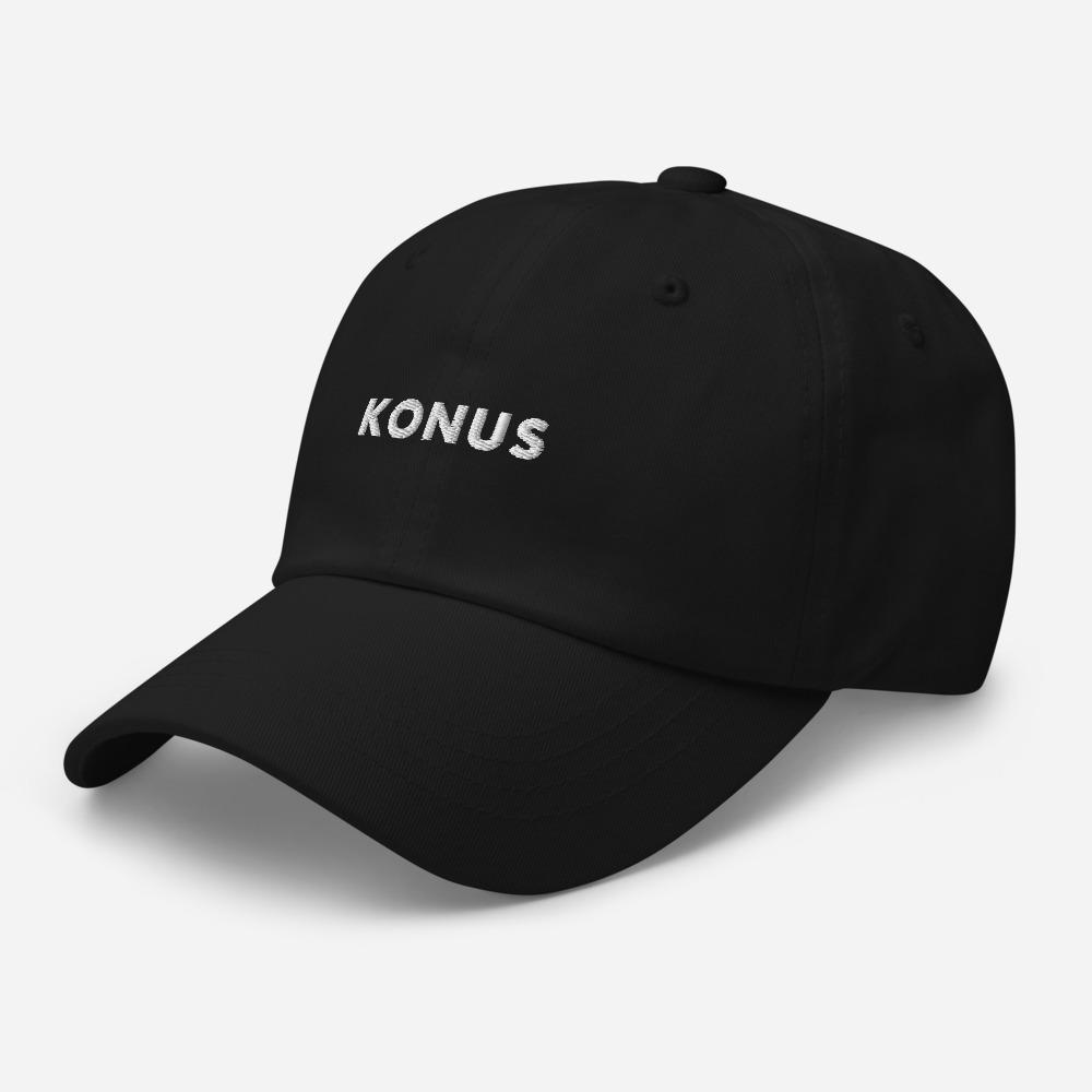 A stylish Konus Dad Hat featuring a low profile, adjustable strap, and curved visor, made from 100% chino cotton twill.