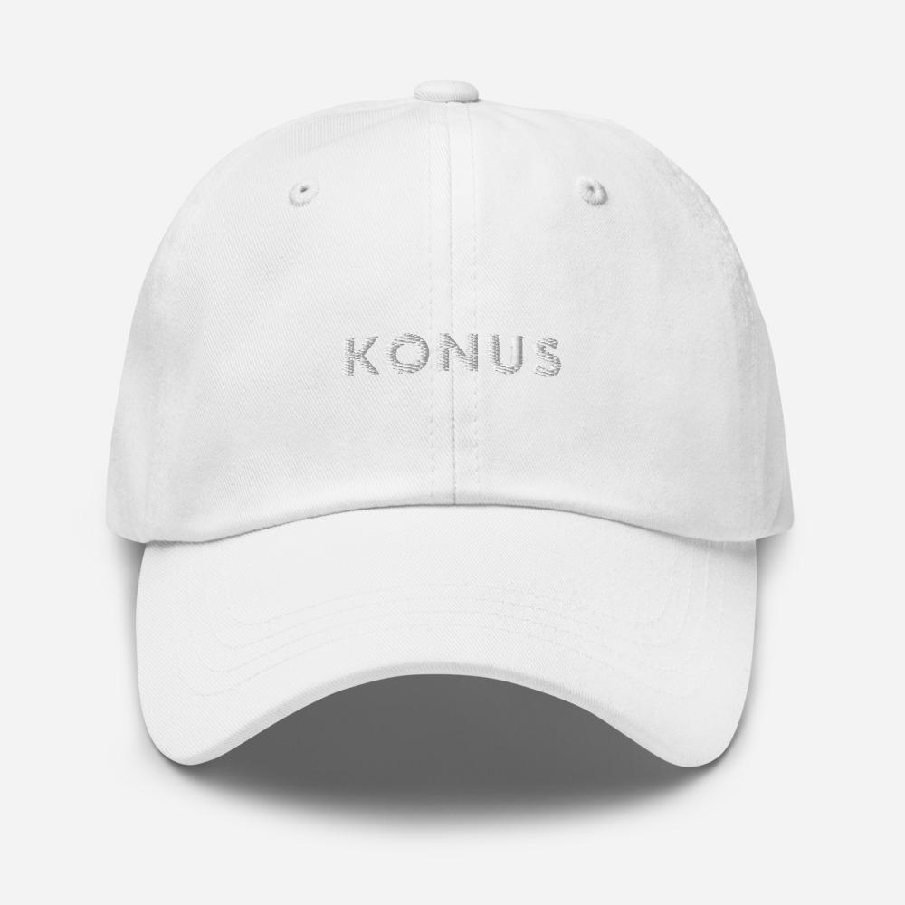 A stylish Konus Dad Hat featuring a low profile, adjustable strap, and curved visor, made from 100% chino cotton twill.