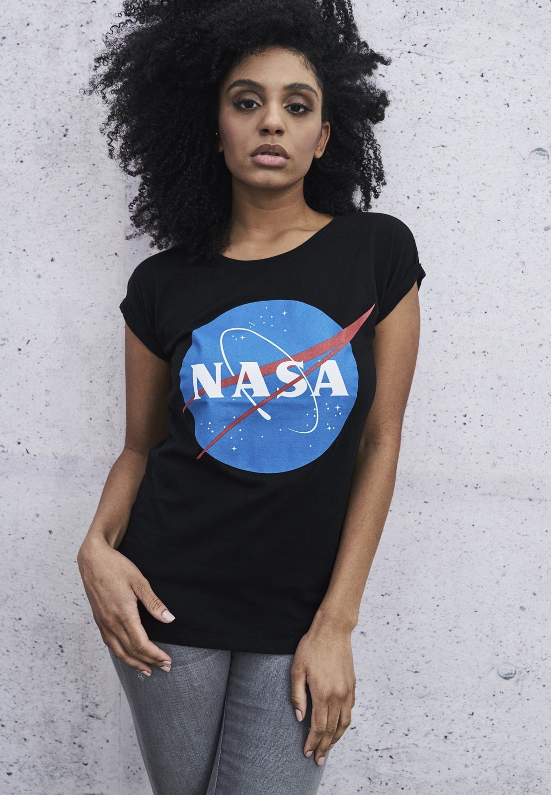 A stylish Ladies NASA Insignia T-Shirt made from 100% cotton, featuring the iconic NASA logo in a vibrant design.