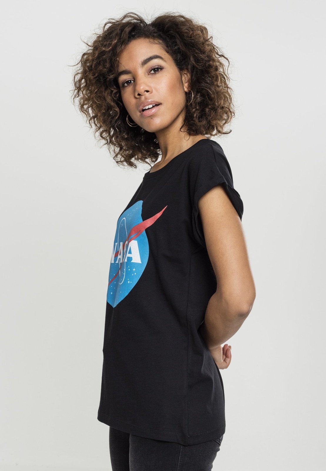 A stylish Ladies NASA Insignia T-Shirt made from 100% cotton, featuring the iconic NASA logo in a vibrant design.