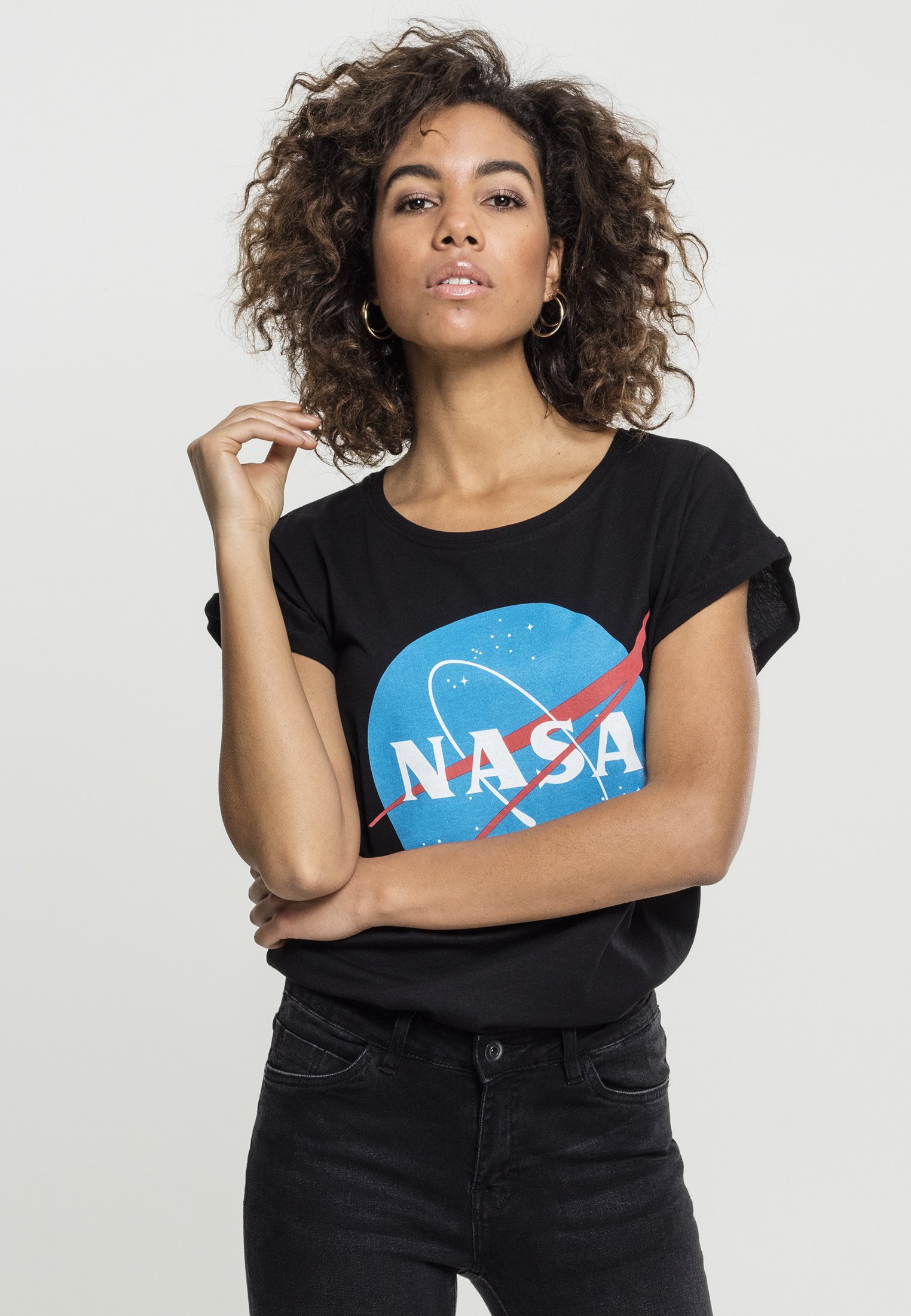 A stylish Ladies NASA Insignia T-Shirt made from 100% cotton, featuring the iconic NASA logo in a vibrant design.