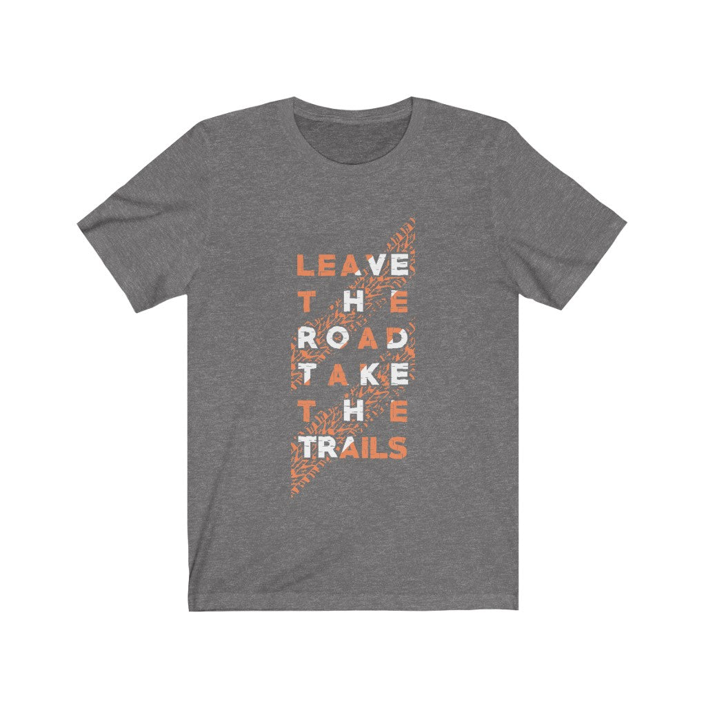 A comfortable unisex t-shirt featuring the phrase 'Leave the Road Take the Trails' in a stylish vinyl print, made from 100% soft cotton.