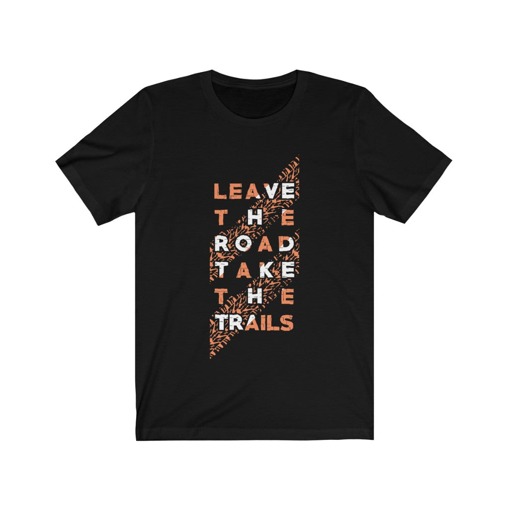 A comfortable unisex t-shirt featuring the phrase 'Leave the Road Take the Trails' in a stylish vinyl print, made from 100% soft cotton.