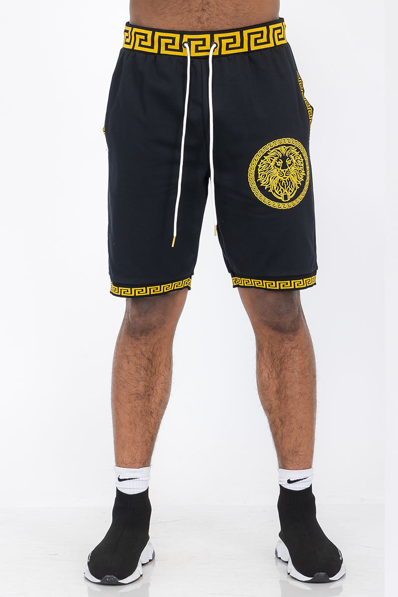 A pair of stylish Lion Head Shorts featuring an elastic waist, drawstring, and pockets, perfect for casual wear.