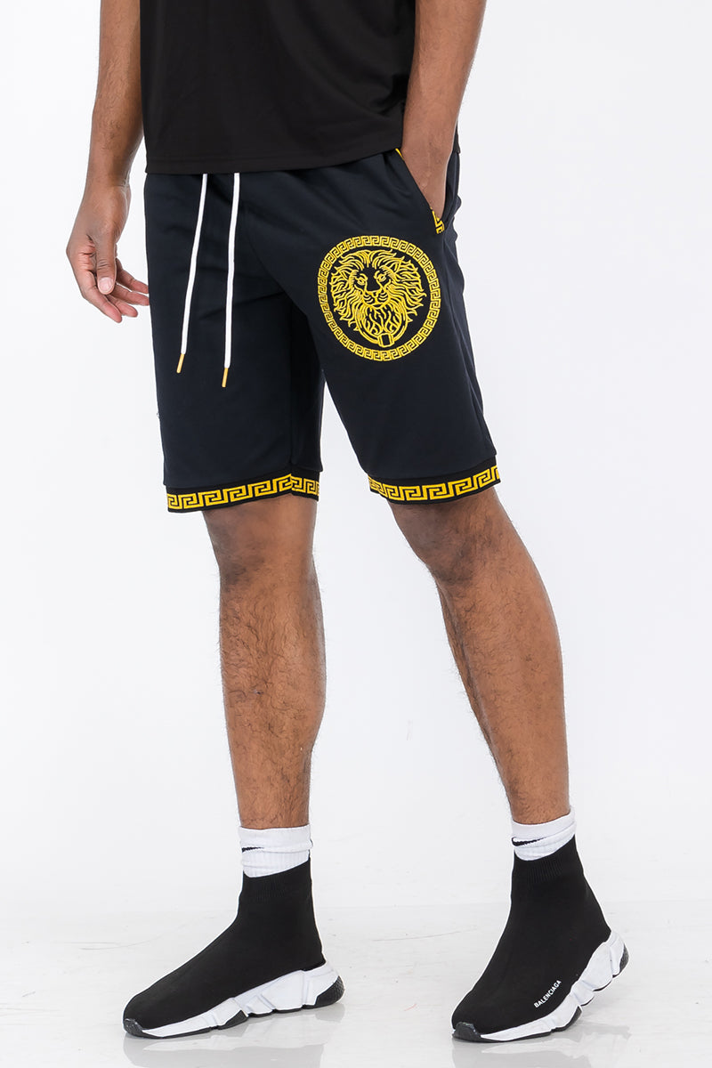 A pair of stylish Lion Head Shorts featuring an elastic waist, drawstring, and pockets, perfect for casual wear.