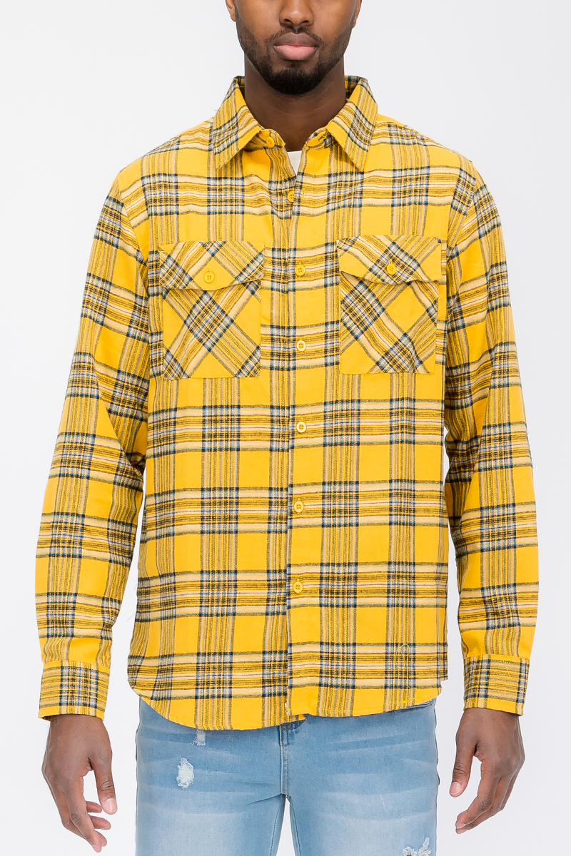 A stylish Long Sleeve Checkered Flannel Shirt featuring a classic checkered pattern, chest pockets, and a curved hem, perfect for casual wear.