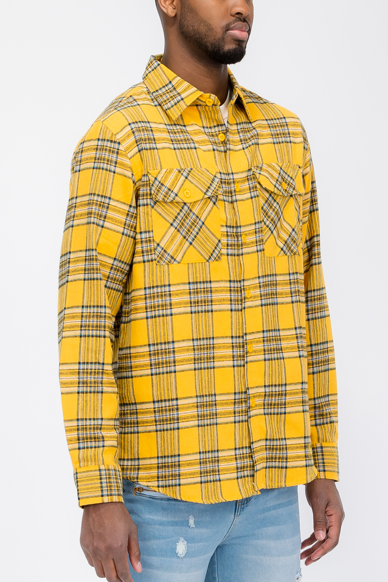 A stylish Long Sleeve Checkered Flannel Shirt featuring a classic checkered pattern, chest pockets, and a curved hem, perfect for casual wear.