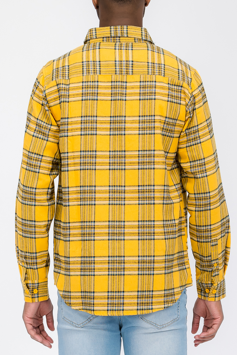 A stylish Long Sleeve Checkered Flannel Shirt featuring a classic checkered pattern, chest pockets, and a curved hem, perfect for casual wear.