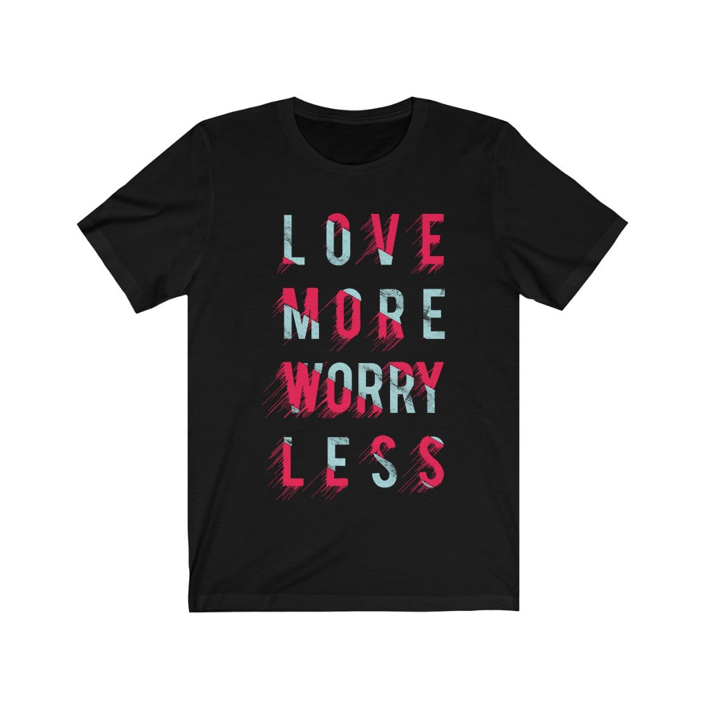 A soft cotton unisex t-shirt featuring the phrase 'Love More Worry Less' in vibrant vinyl print, perfect for casual wear.