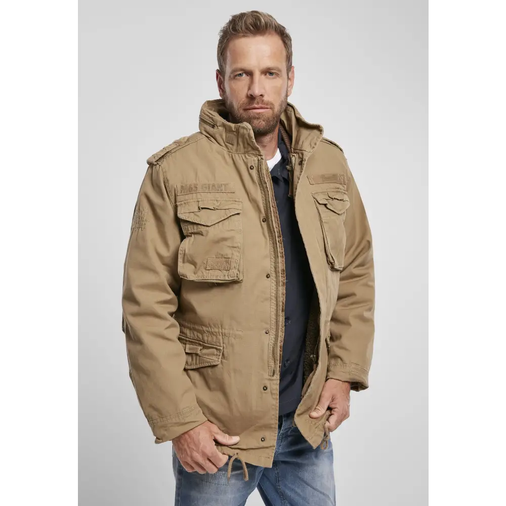 M65 Giant Jacket featuring a heavy cotton outer layer, removable inner jacket, and adjustable waist for a stylish and versatile look.