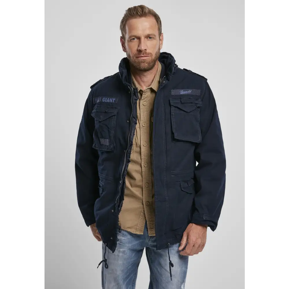 M65 Giant Jacket featuring a heavy cotton outer layer, removable inner jacket, and adjustable waist for a stylish and versatile look.