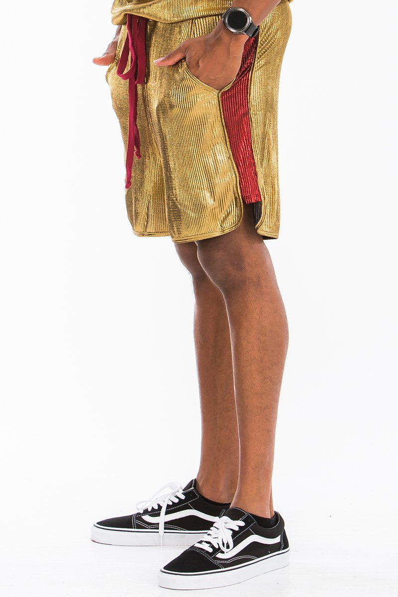 A pair of metallic boxer shorts featuring an elastic waist and drawstring, showcasing a stylish knee-length design.