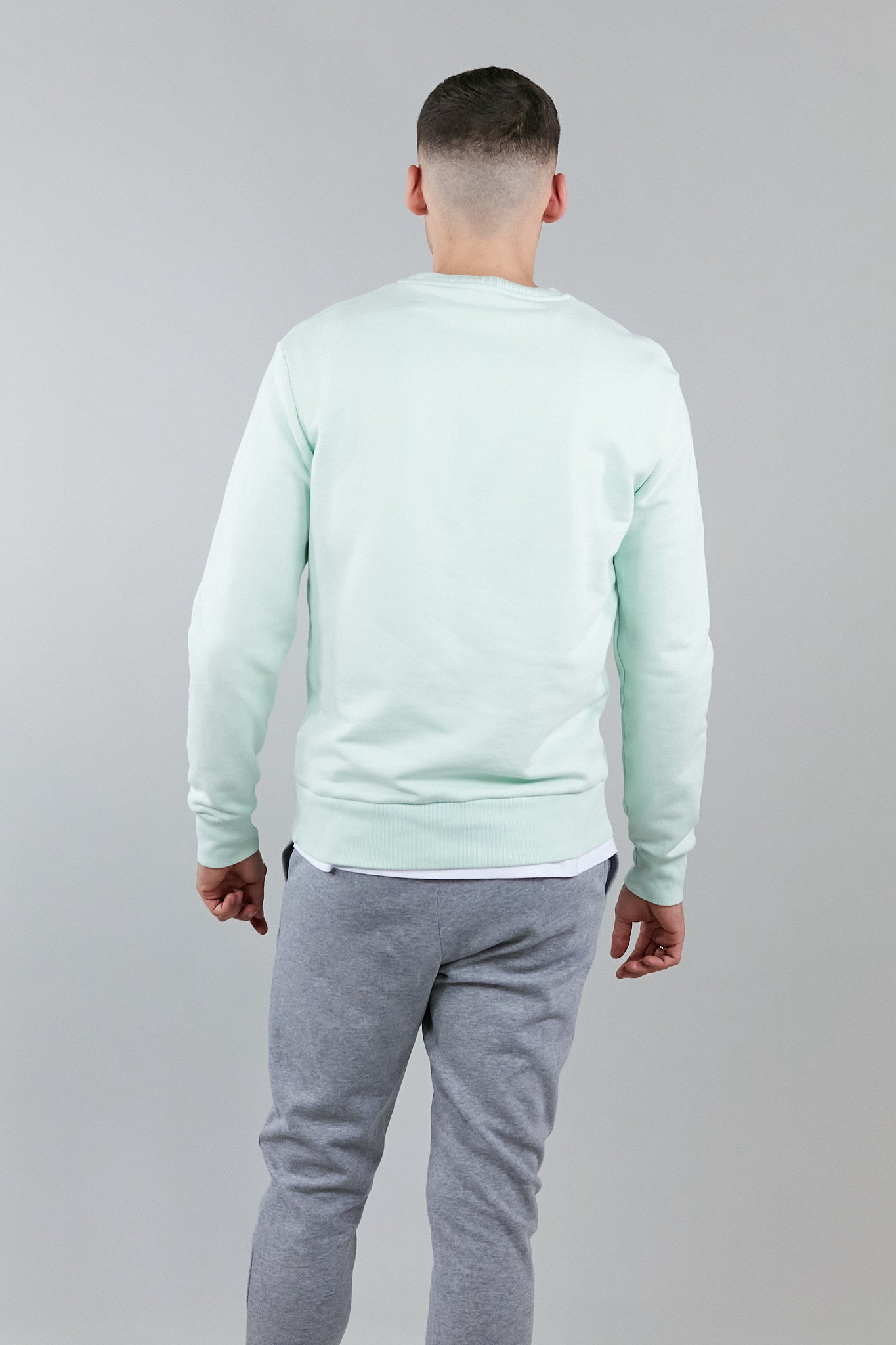 Mint graphic sweatshirt made from 100% organic cotton featuring altid logo on the chest, perfect for casual wear.