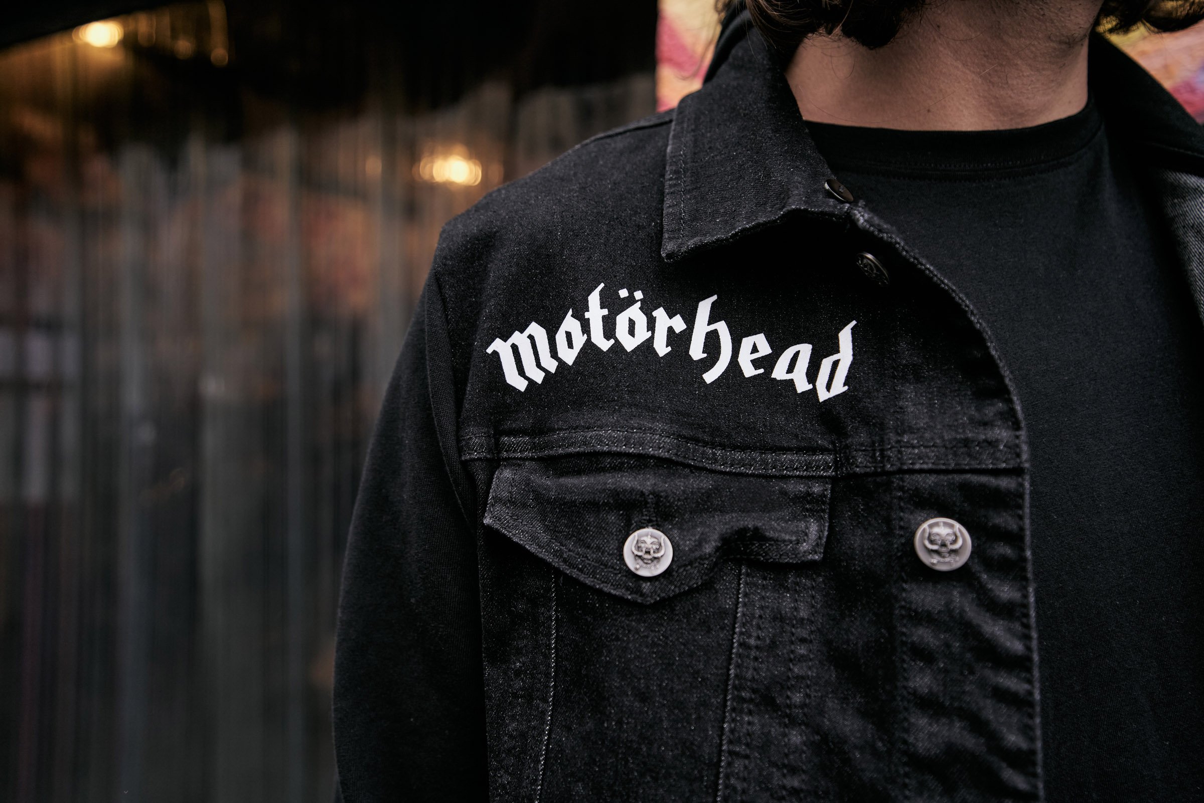 Motörhead Cradock Denim Jacket featuring large back print, detachable hood, and multiple pockets, showcasing a classic rock style.