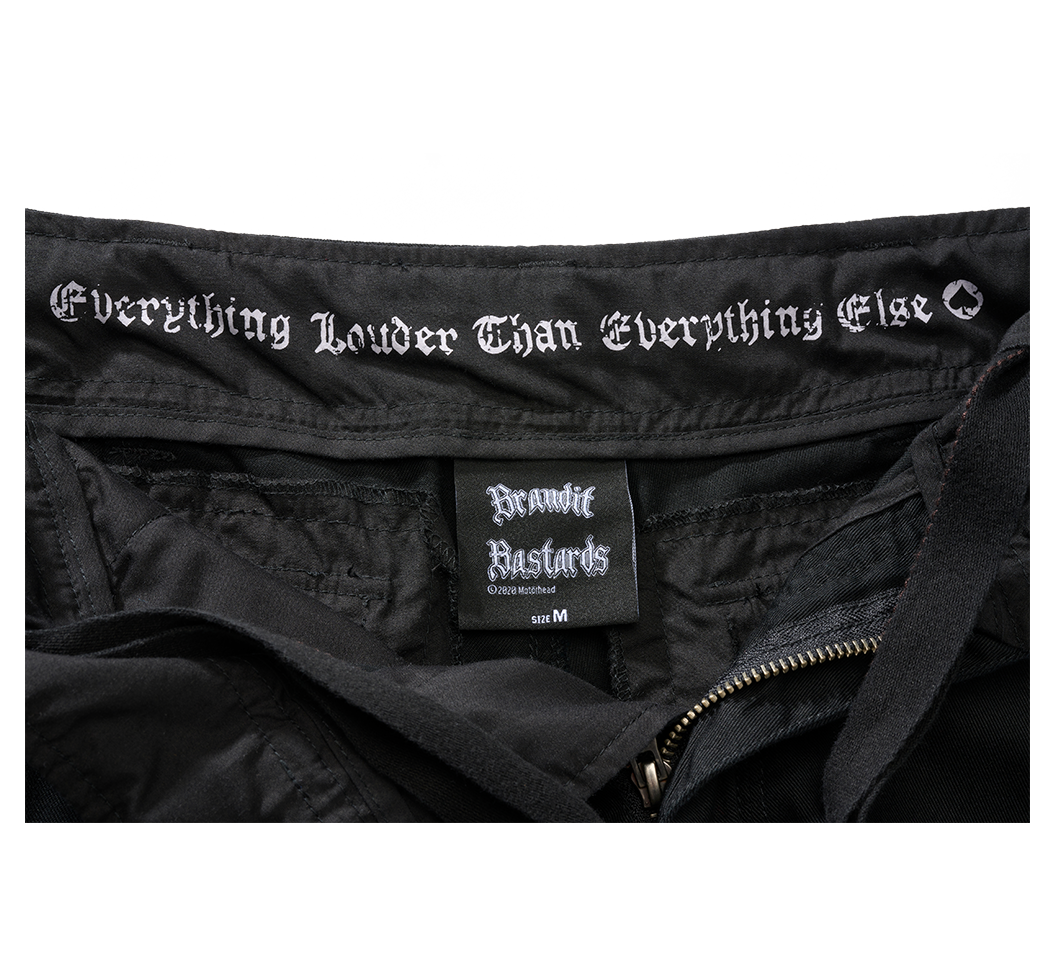 Pants label with gothic text.