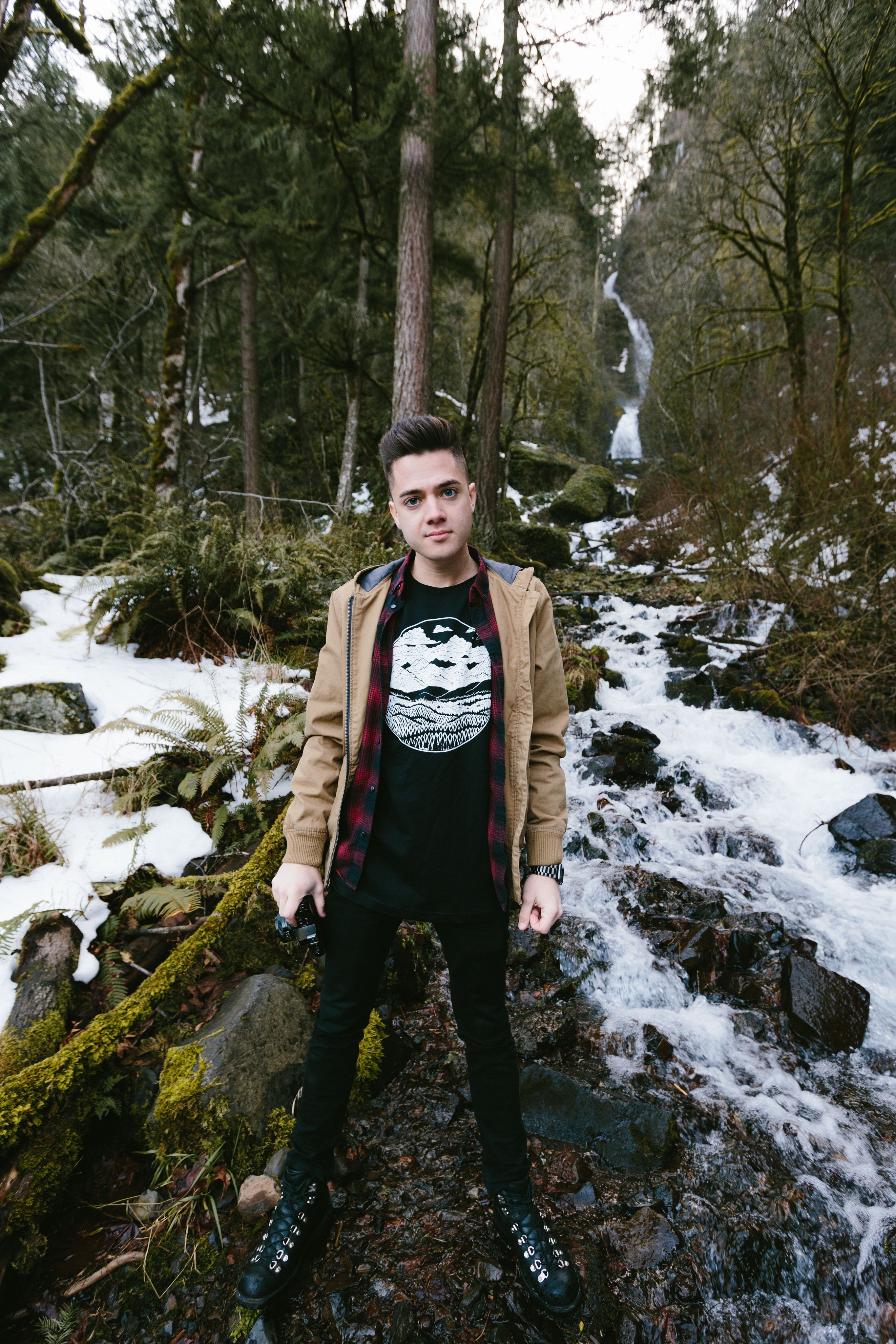 Black Mountain Range Tee featuring a white screen printed mountain design, made from 100% ringspun cotton, ideal for outdoor enthusiasts.