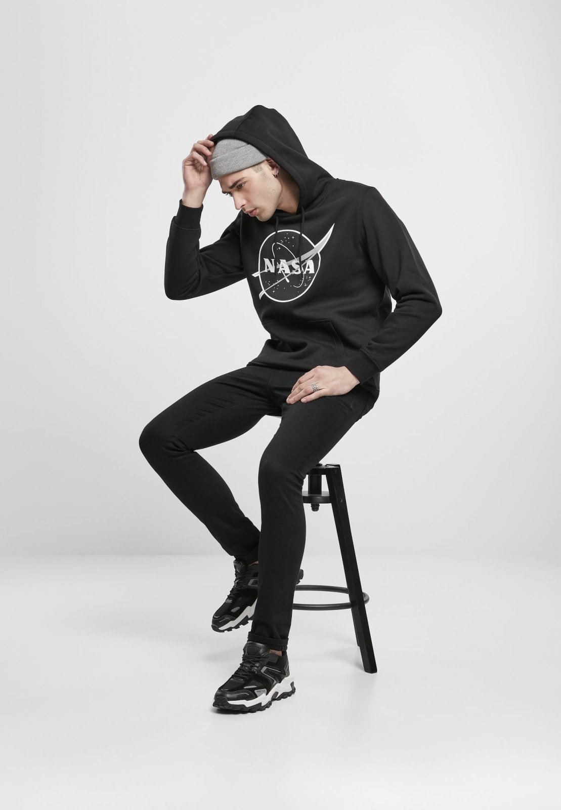 A stylish black hoodie featuring the iconic NASA logo, perfect for space enthusiasts.