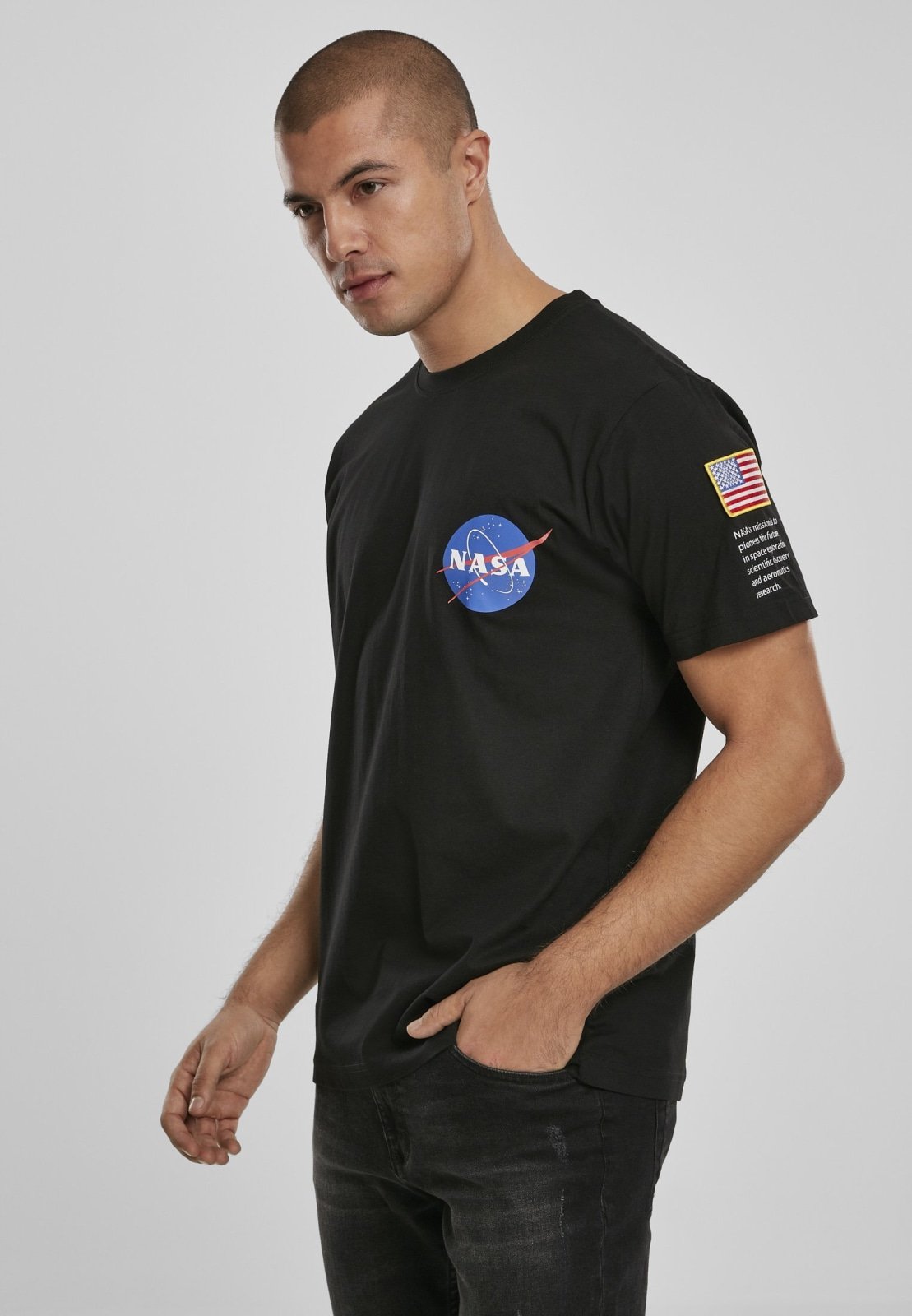 NASA Insignia Logo Flag Tee made of 100% cotton, featuring the iconic NASA logo in vibrant colors.