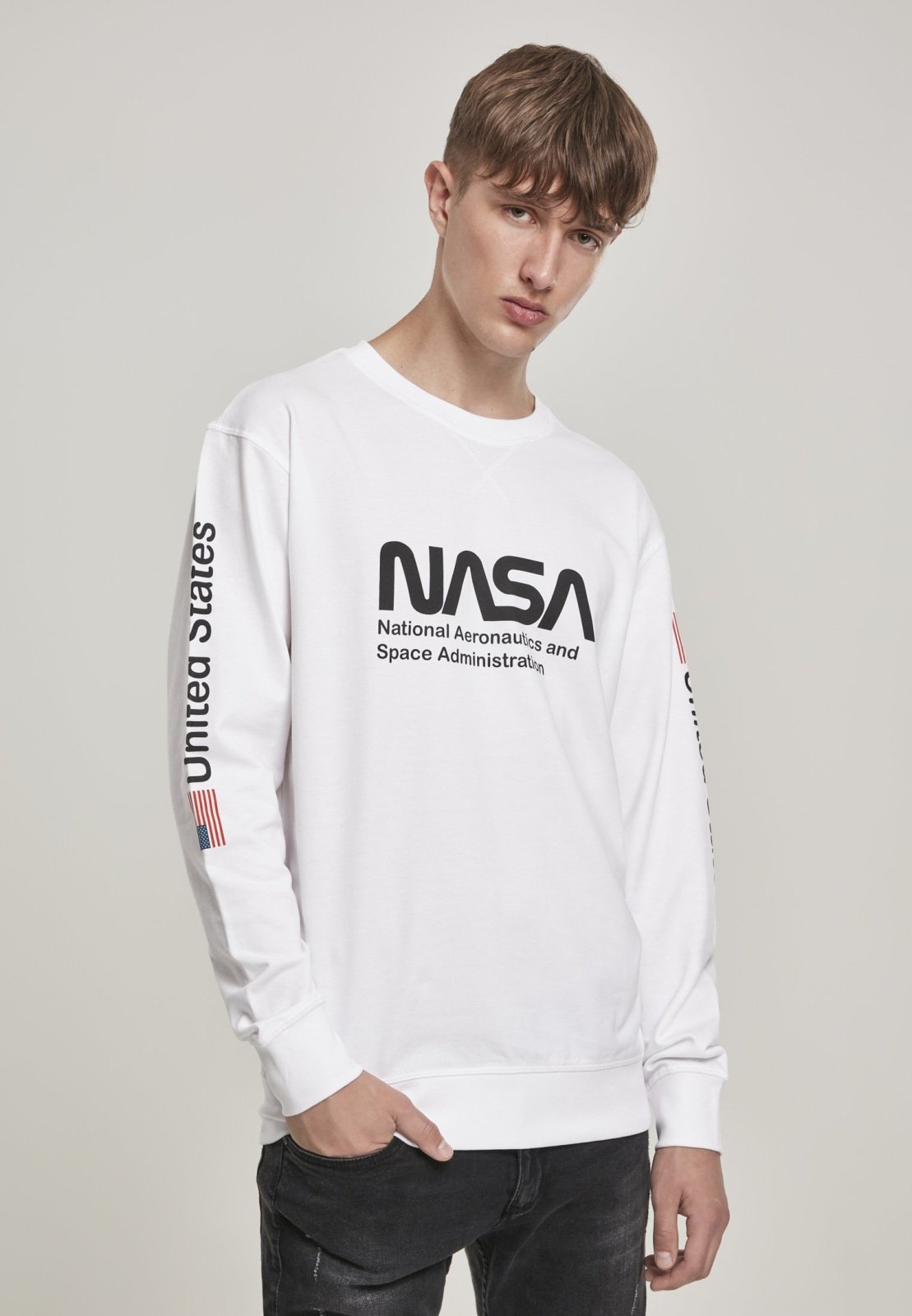 NASA United States Longsleeve crewneck shirt featuring a meaningful front and sleeve print, made from 100% cotton for comfort.