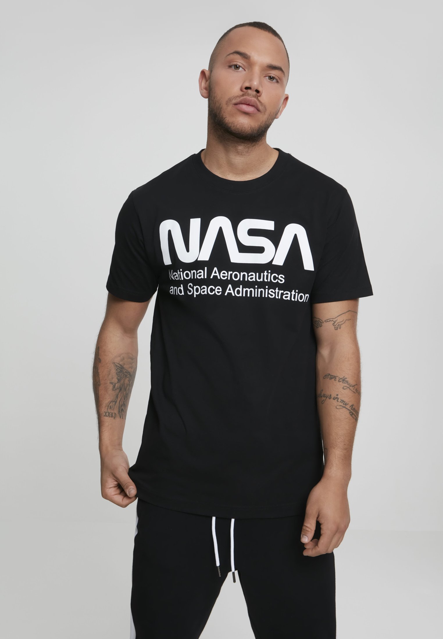 A comfortable NASA Wormlogo Tee made of 100% cotton featuring the iconic NASA worm logo in bold print.