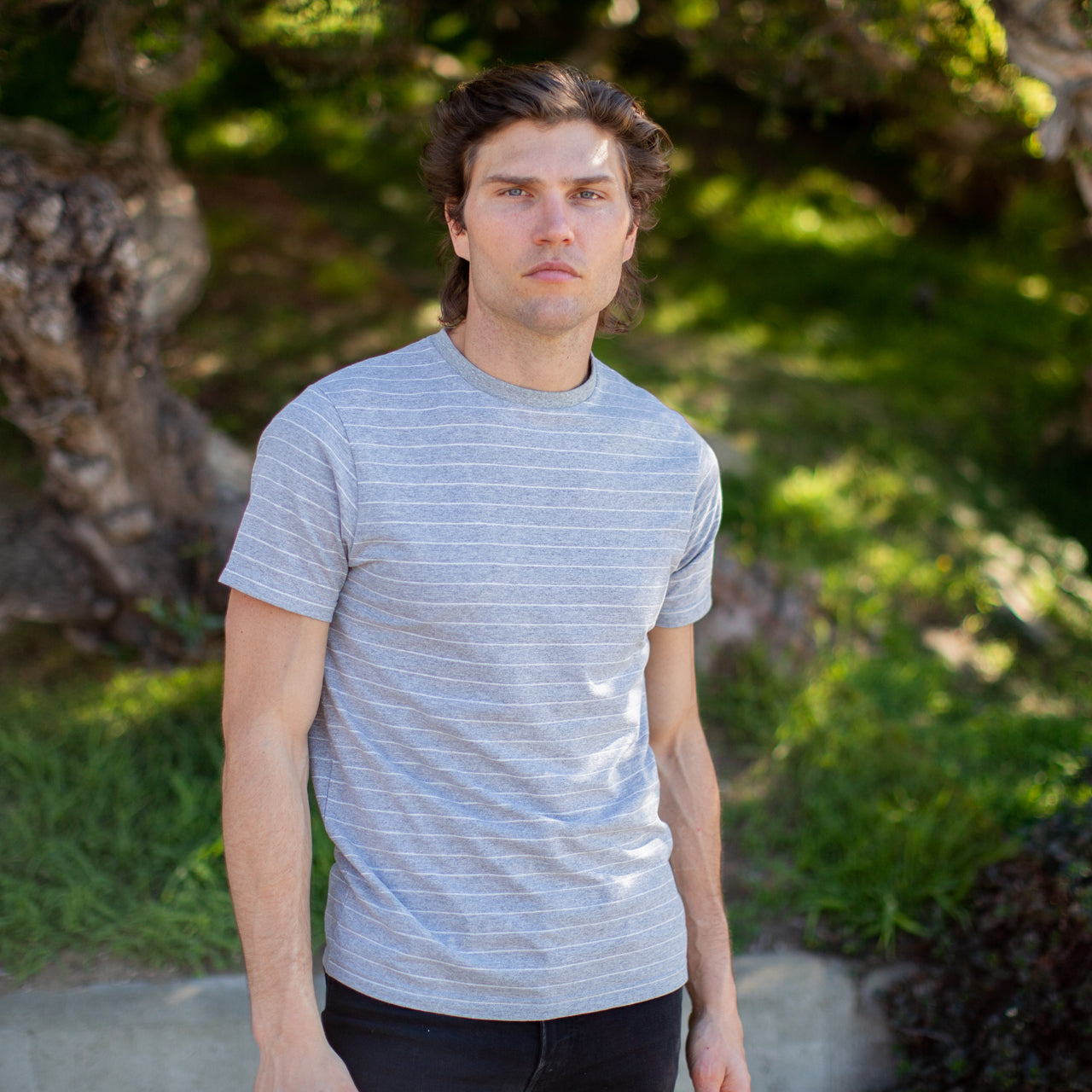 Nate Jacquard Striped Tee in Grey Heather, showcasing its stylish jacquard stripes and short sleeves.