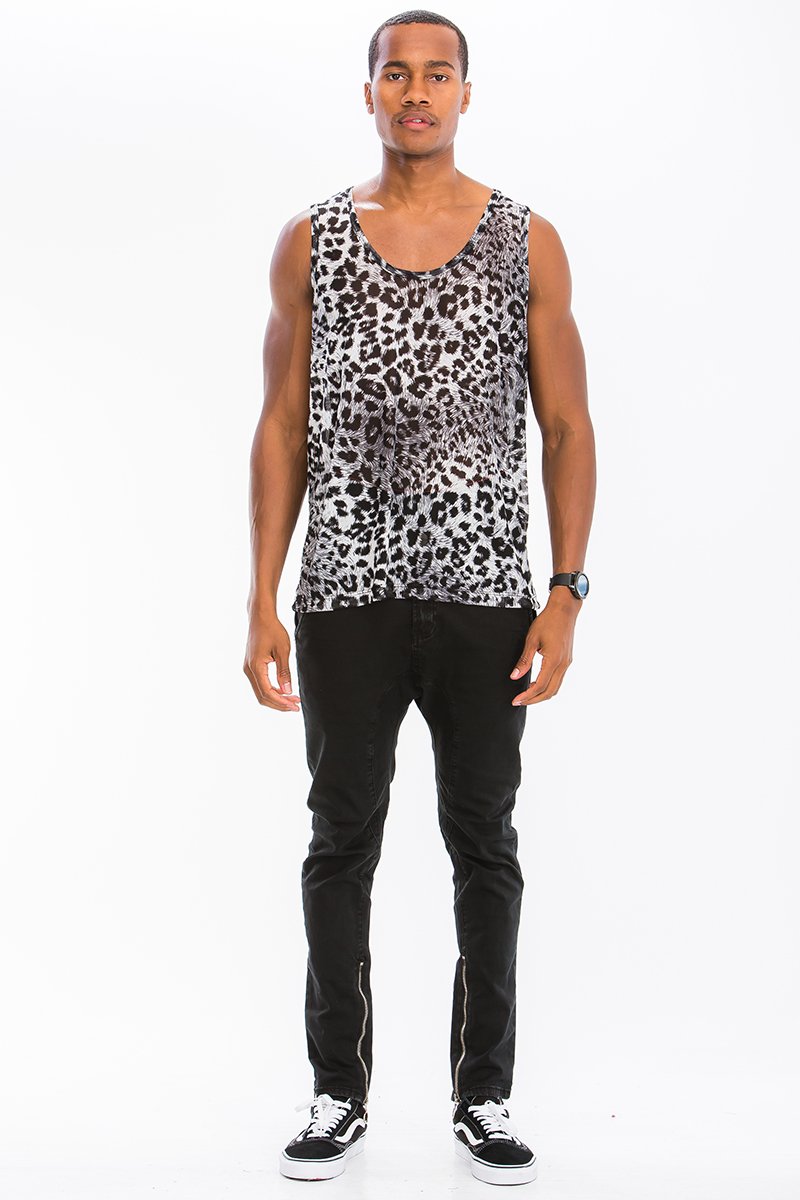 A stylish neutral leopard spot tank top displayed on a mannequin, showcasing its lightweight fabric and trendy design.