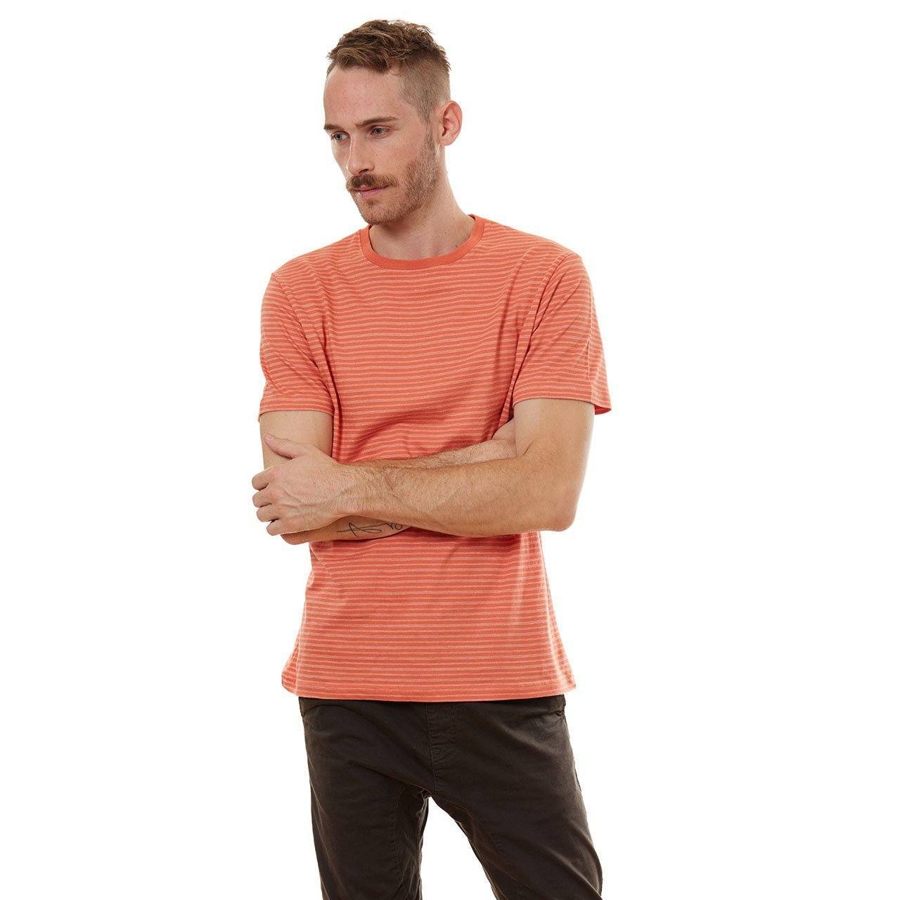 Nixon Striped Tee featuring thin stripes, short sleeves, and a crew neck design, made from eco-friendly materials.