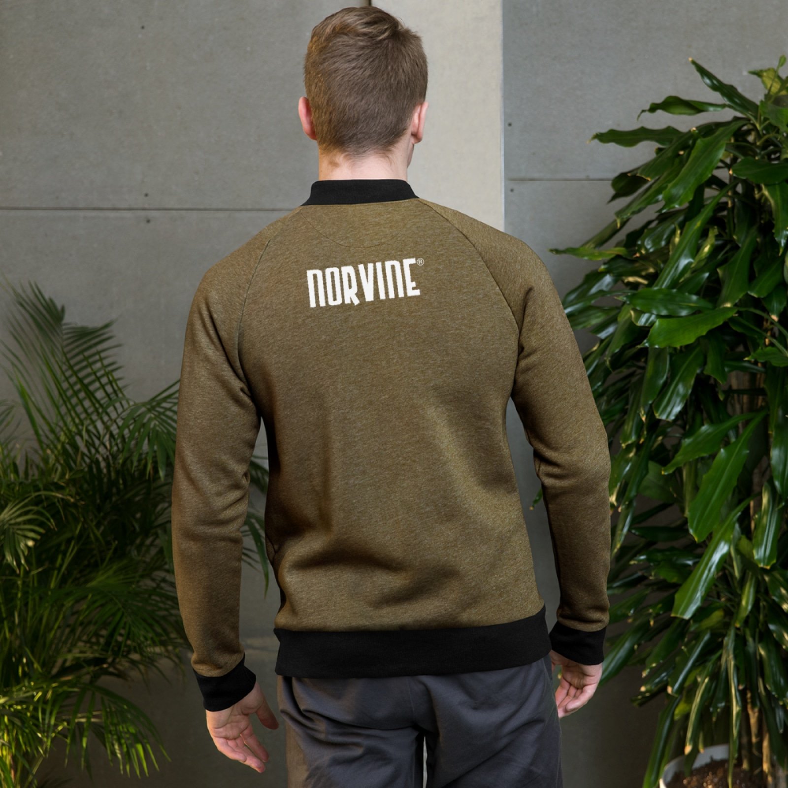 Norvine Light Bomber Jacket featuring ribbed neck, cuffs, and stylish design with slash pockets.