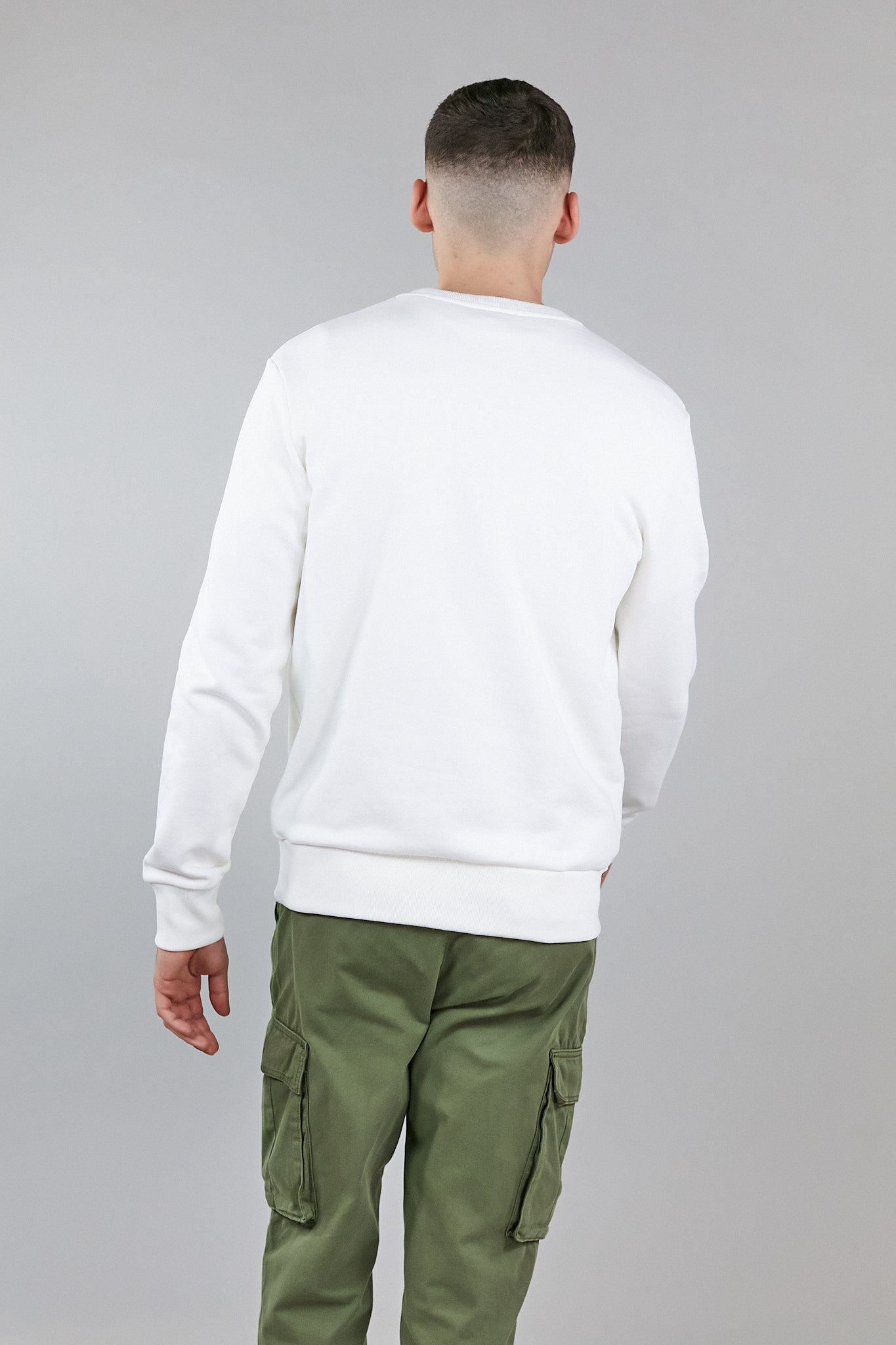 Off white crew neck sweatshirt made from 100% organic cotton, featuring an embroidered logo and a regular fit.