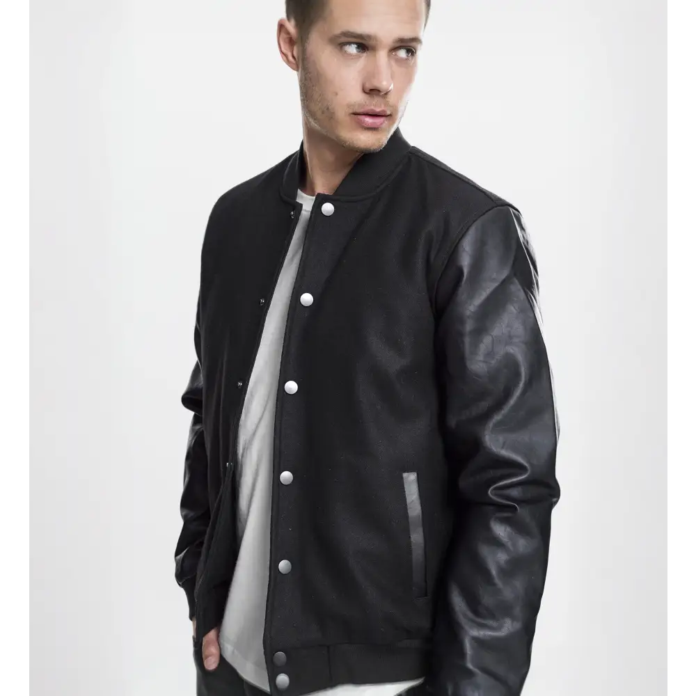 Oldschool College Jacket featuring a sporty design with nylon upper and faux leather sleeves, perfect for everyday wear.