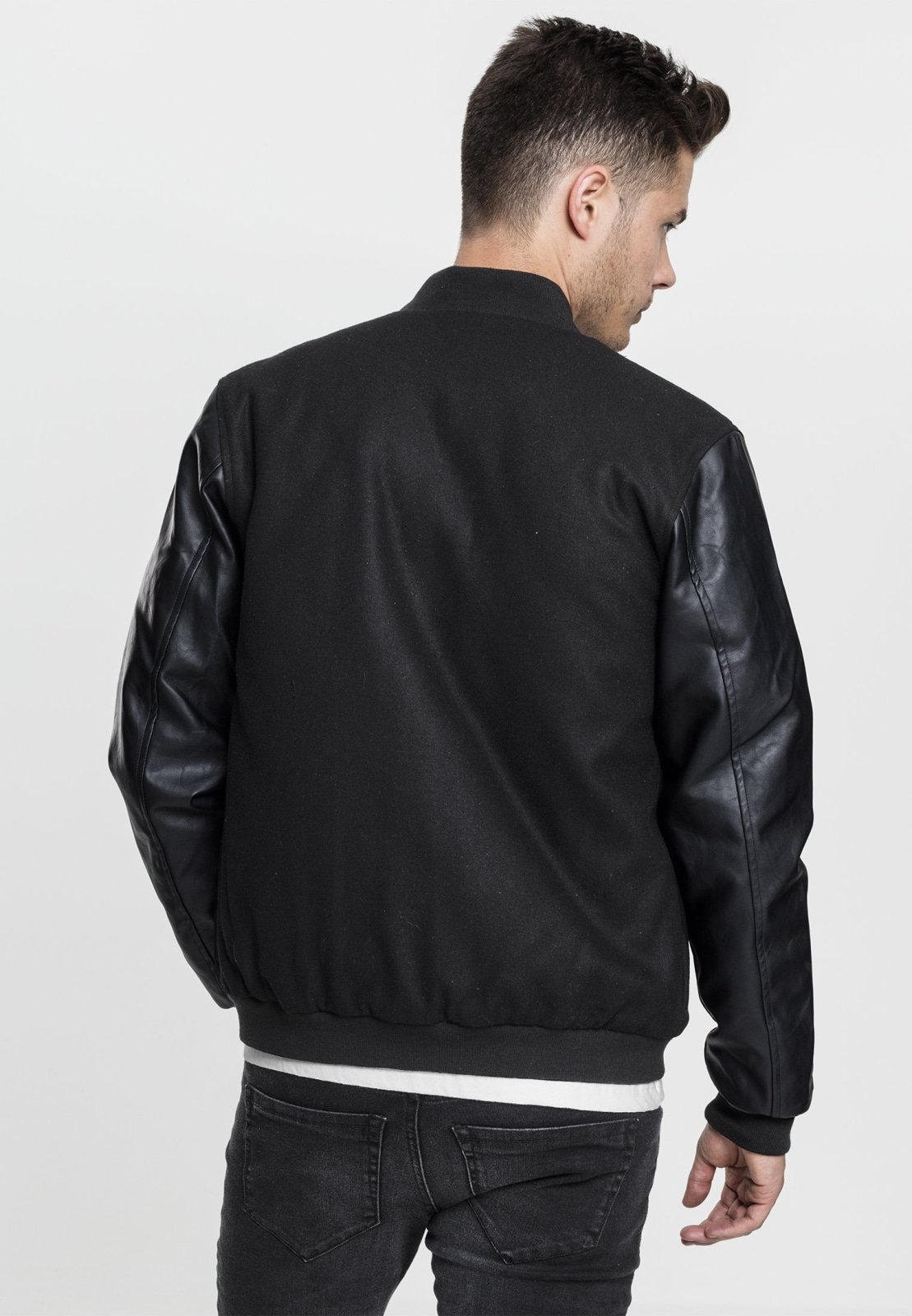 Oldschool College Jacket featuring a sporty design with nylon upper and faux leather sleeves, perfect for everyday wear.