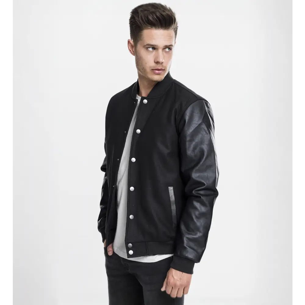 Oldschool College Jacket featuring a sporty design with nylon upper and faux leather sleeves, perfect for everyday wear.