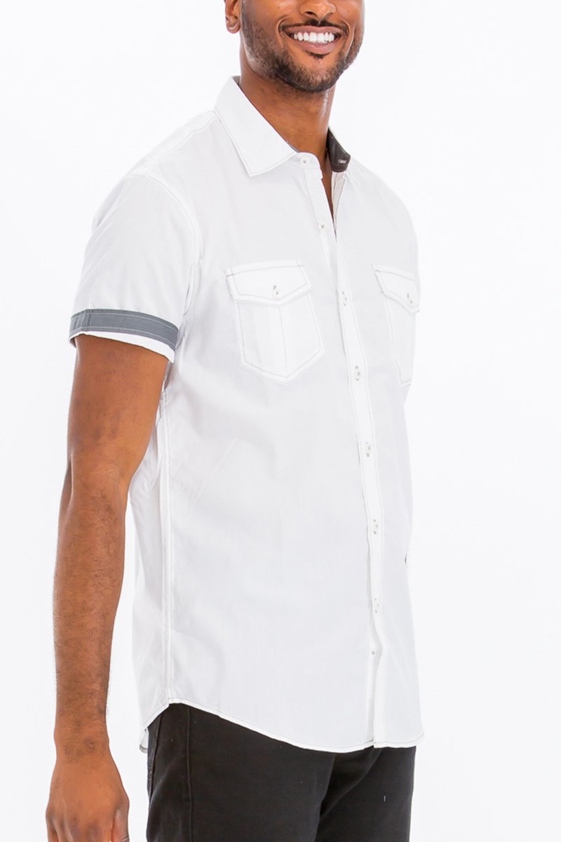 Outline Stitch Two Pocket Shirt in solid color with short sleeves and buttoned chest pockets, showcasing a casual and stylish design.