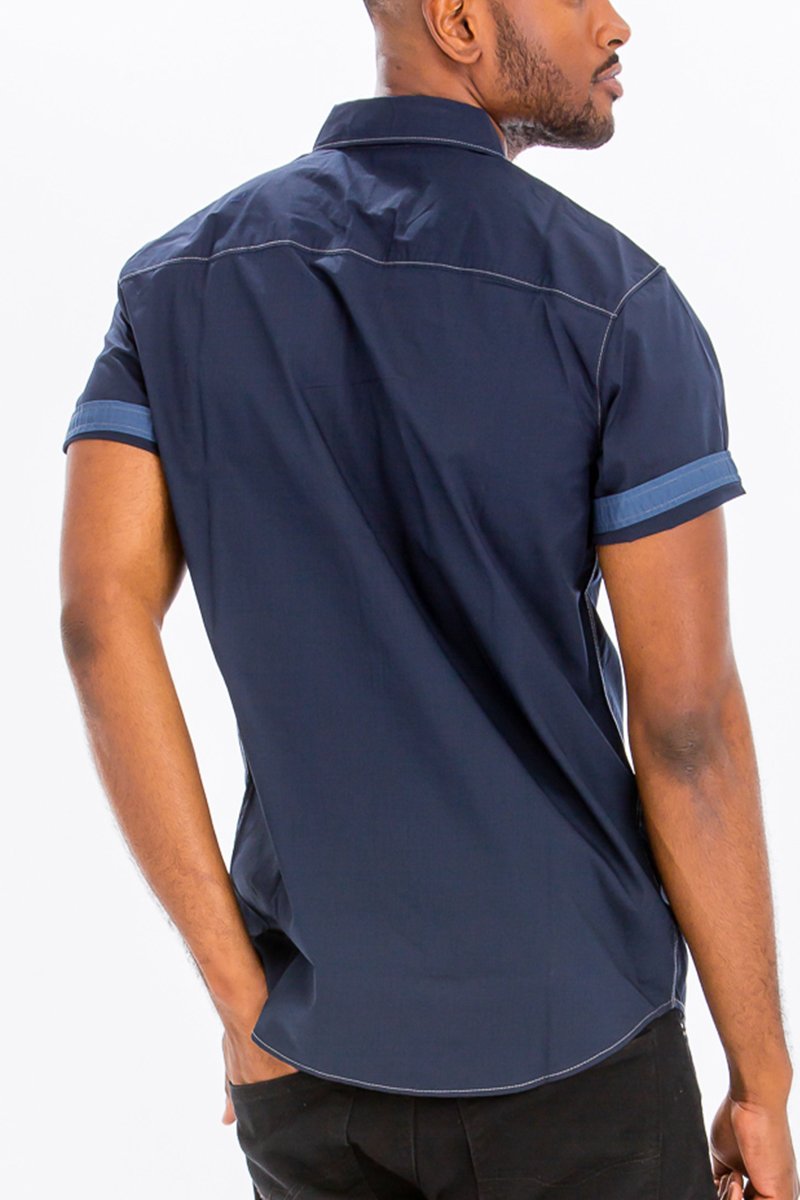 Outline Stitch Two Pocket Shirt in solid color with short sleeves and two chest pockets, showcasing a casual and stylish design.