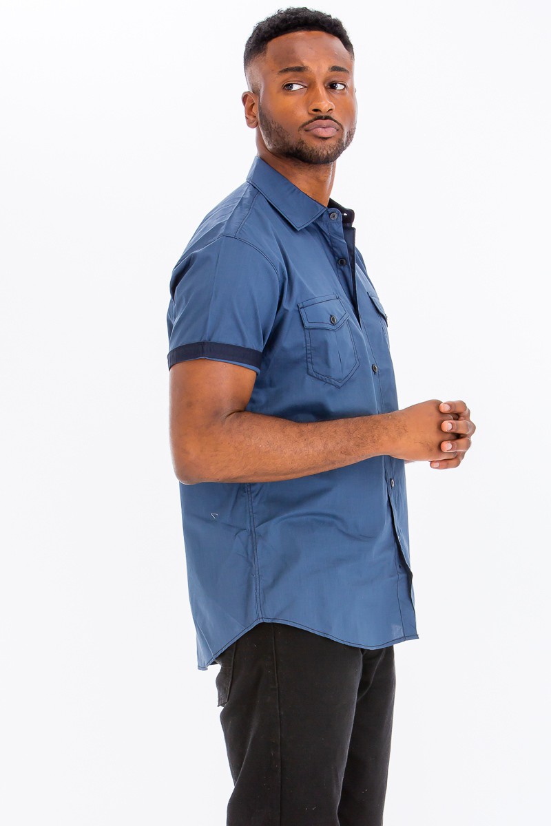 Outline Stitch Two Pocket Shirt in solid color with short sleeves and two buttoned chest pockets, designed for casual wear.