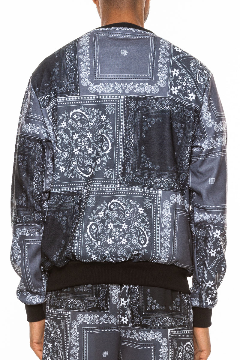 A stylish paisley all over print crewneck featuring a round neck and regular fit, perfect for casual wear.