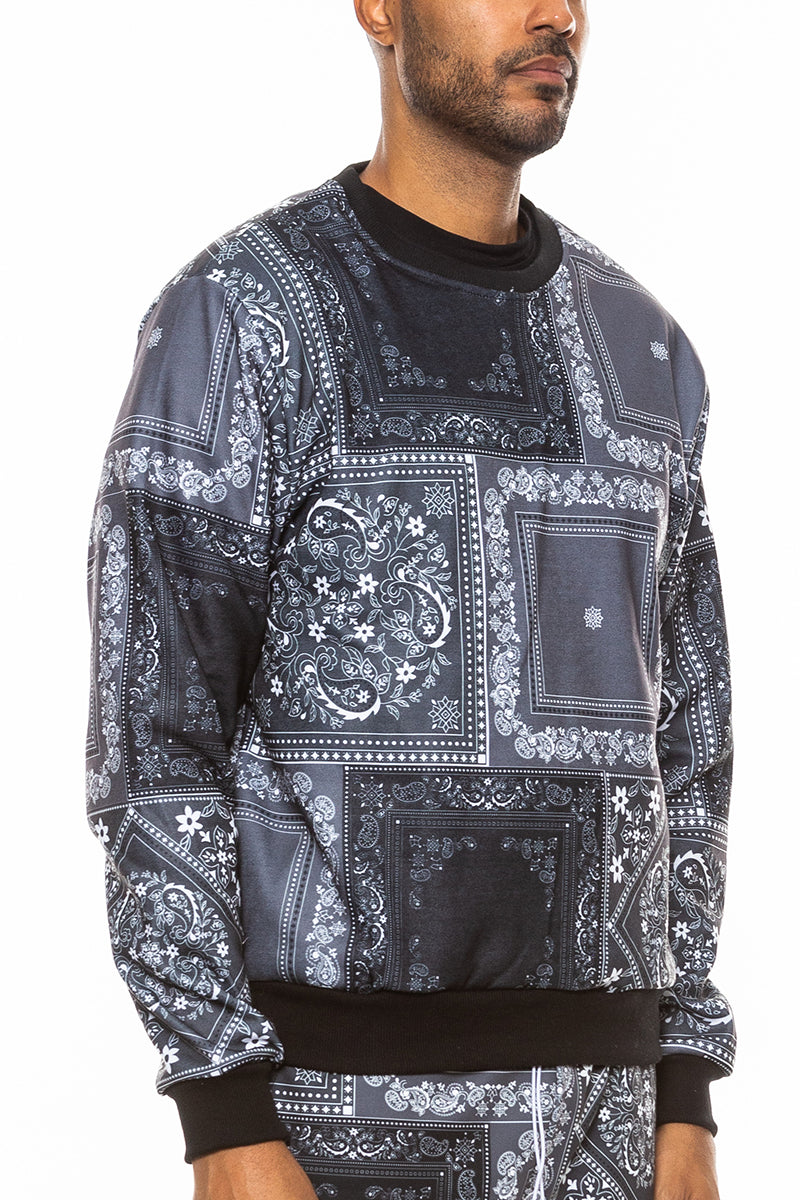 A stylish paisley all over print crewneck featuring a round neck and regular fit, perfect for casual wear.