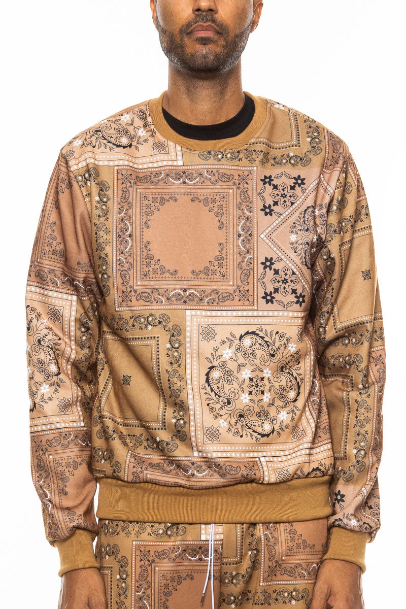 A stylish paisley all over print crewneck featuring a round neck and regular fit, perfect for casual wear.