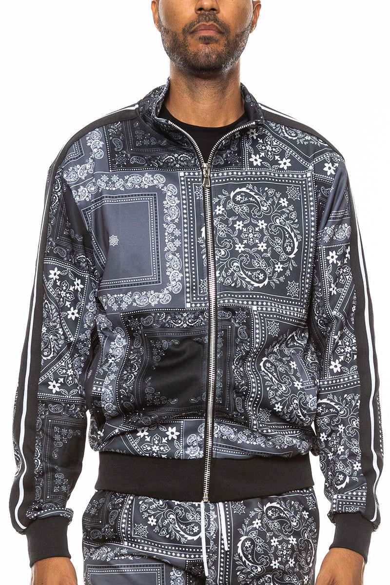 A stylish paisley all over print track jacket featuring a full zip design and collar, perfect for casual wear.