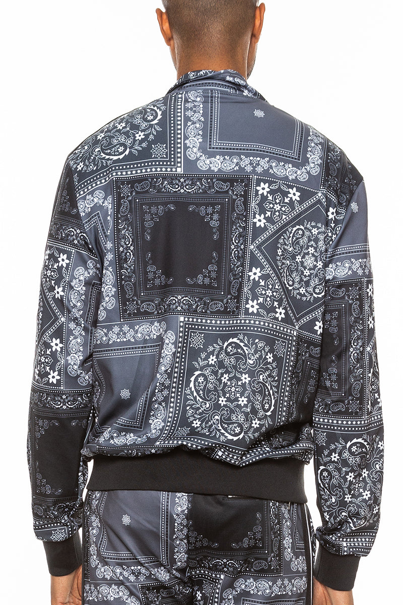 A stylish paisley all over print track jacket featuring a full zip design and collar, perfect for casual wear.