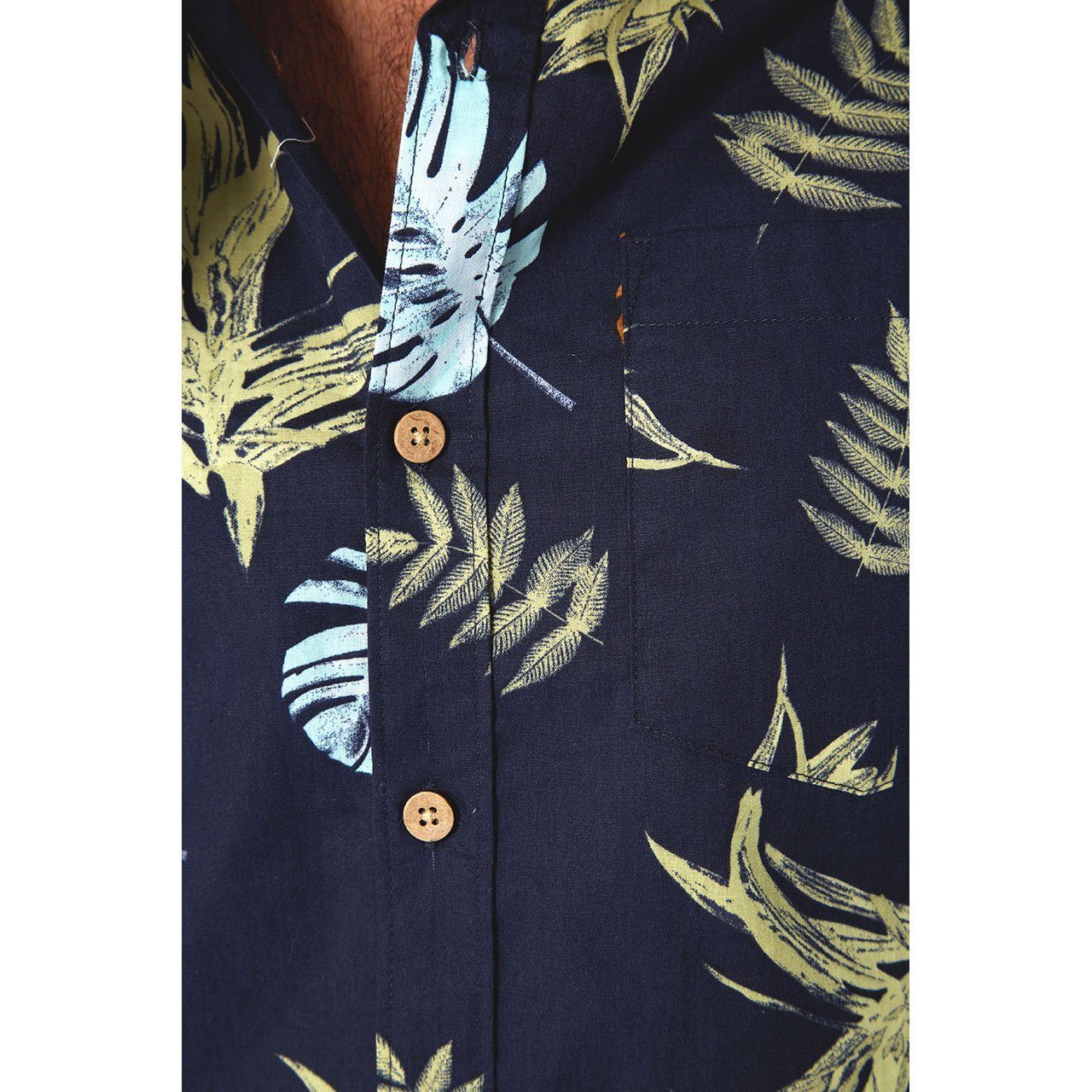 Parker Floral Shirt featuring a vibrant floral print on a short sleeve button-down design, made from 100% cotton.