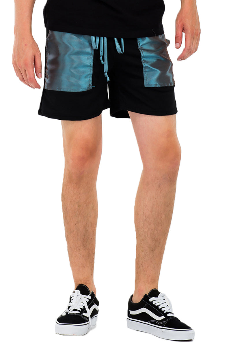 A pair of stylish Peacock Cut Out Shorts featuring a unique design, elastic waist, and drawstring, perfect for casual summer wear.