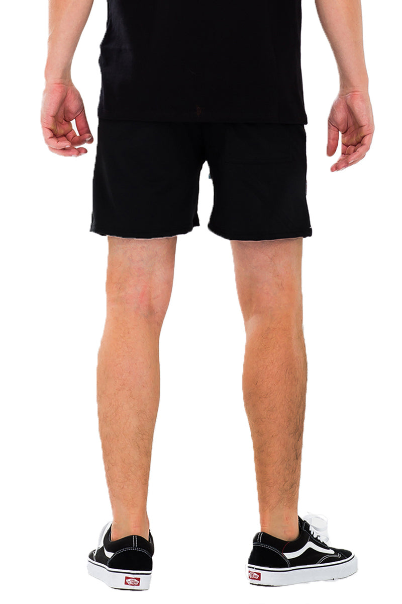 A pair of stylish Peacock Cut Out Shorts featuring a unique design, elastic waist, and drawstring, perfect for casual summer wear.