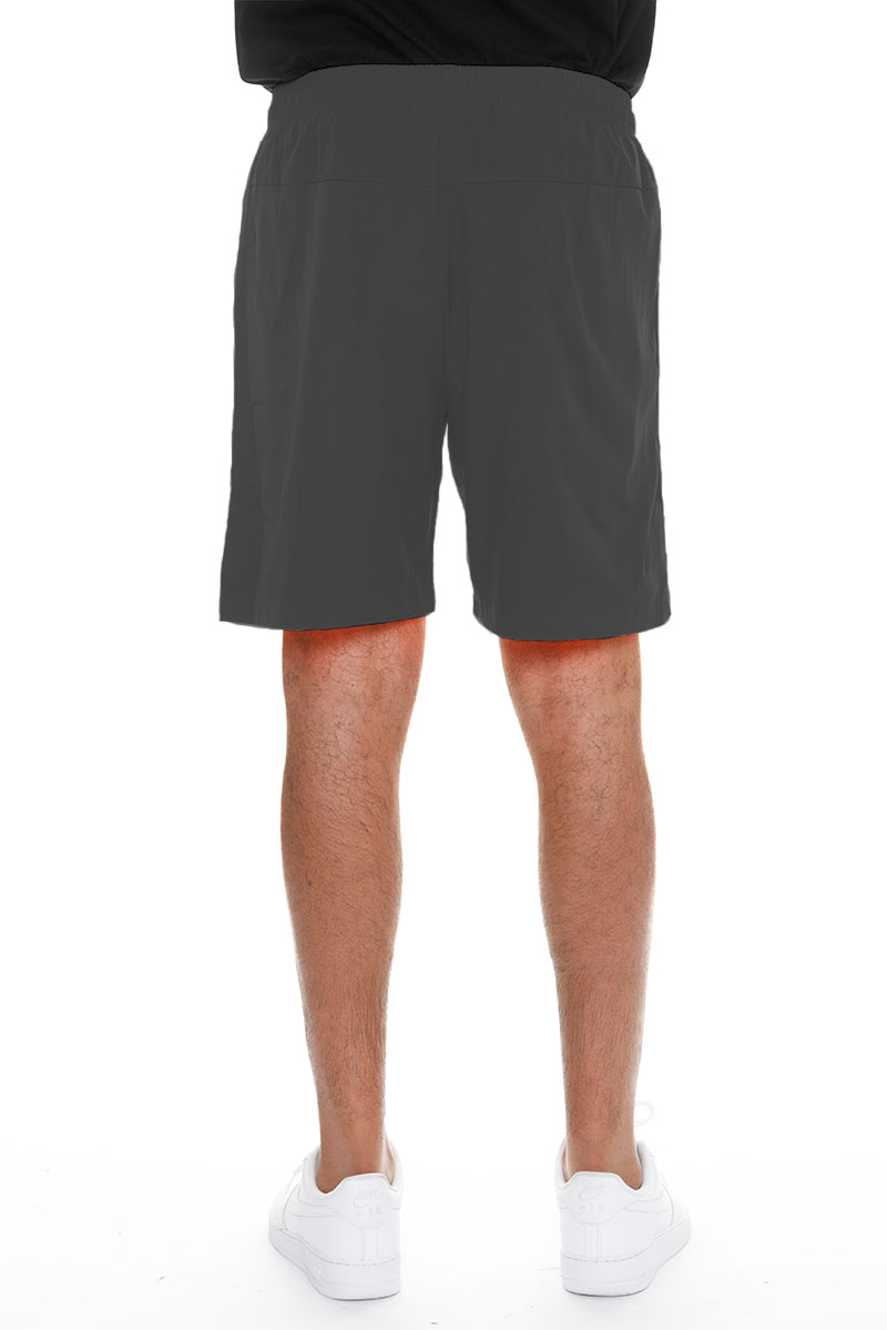 A pair of lightweight PERFORMANCE RUNNING SHORTS featuring zippered pockets and a reflective zipper, made from 100% polyester.