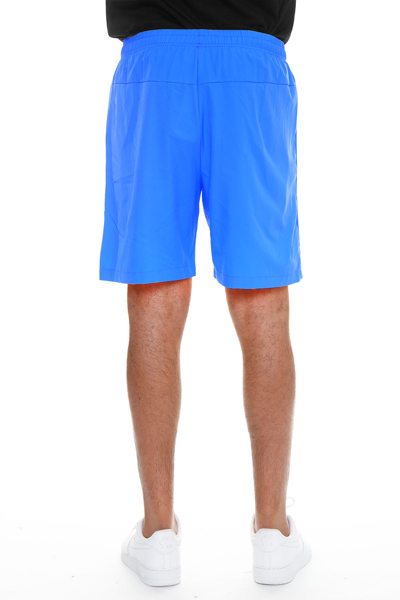 A pair of lightweight PERFORMANCE RUNNING SHORTS featuring zippered pockets and a reflective zipper, made from 100% polyester.