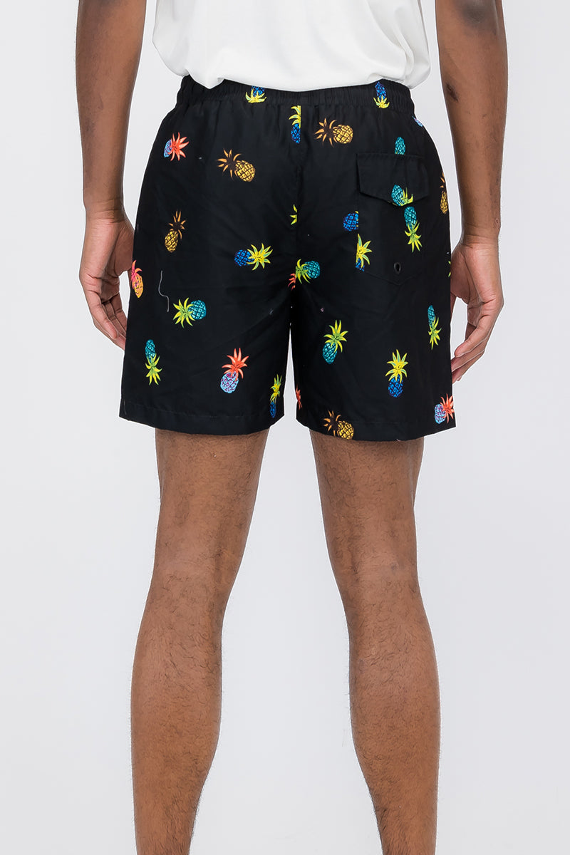 Pineapple Print Swim Shorts featuring vibrant tropical design, regular fit, and mesh lining for comfort.